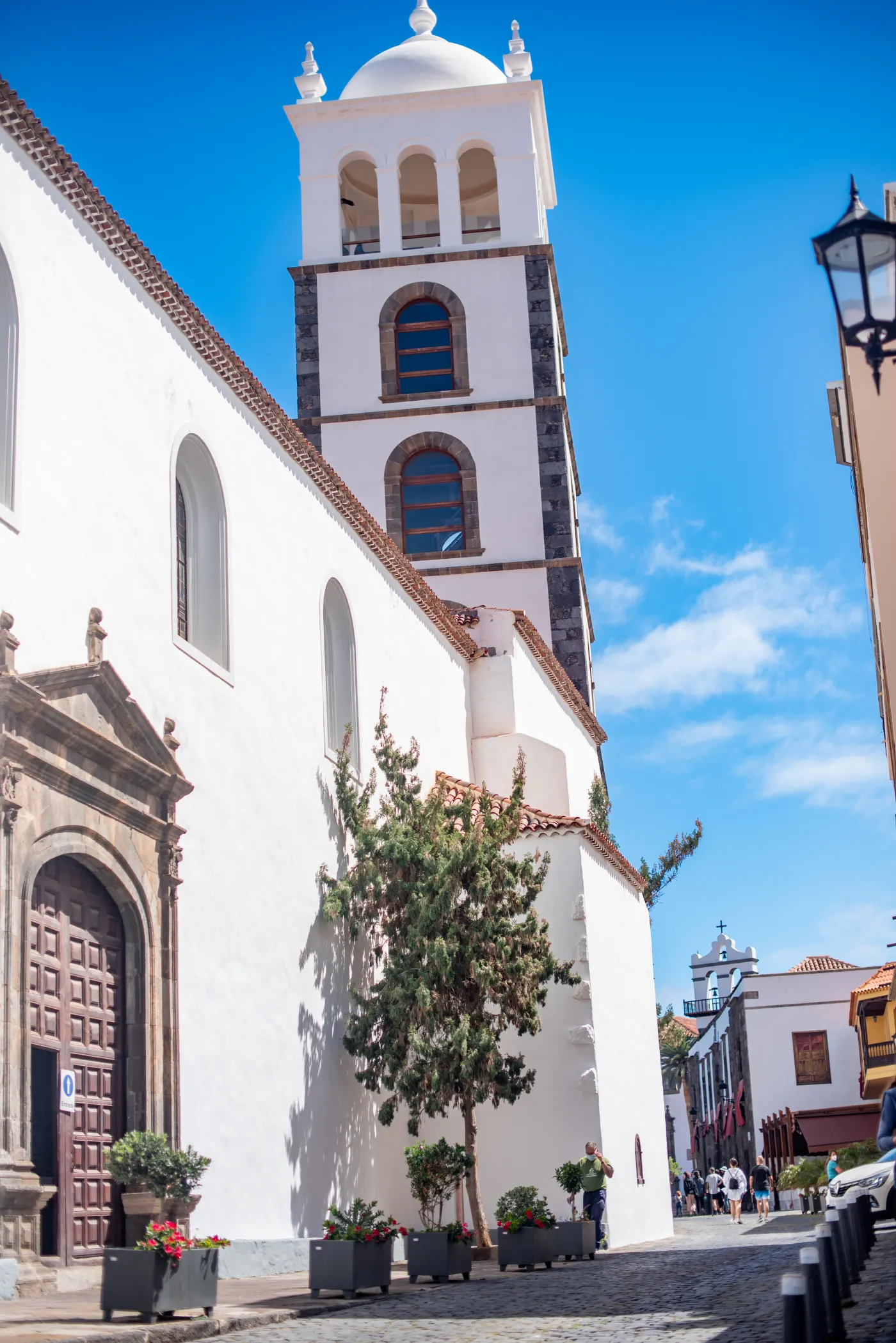 Tower of the church of Santa Ana above the cobbled streets of Garachico